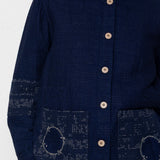 Navy blue jacket with button details on a white background