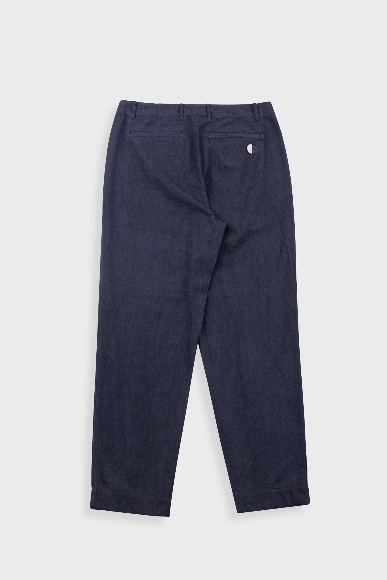 Navy blue pants on a white background