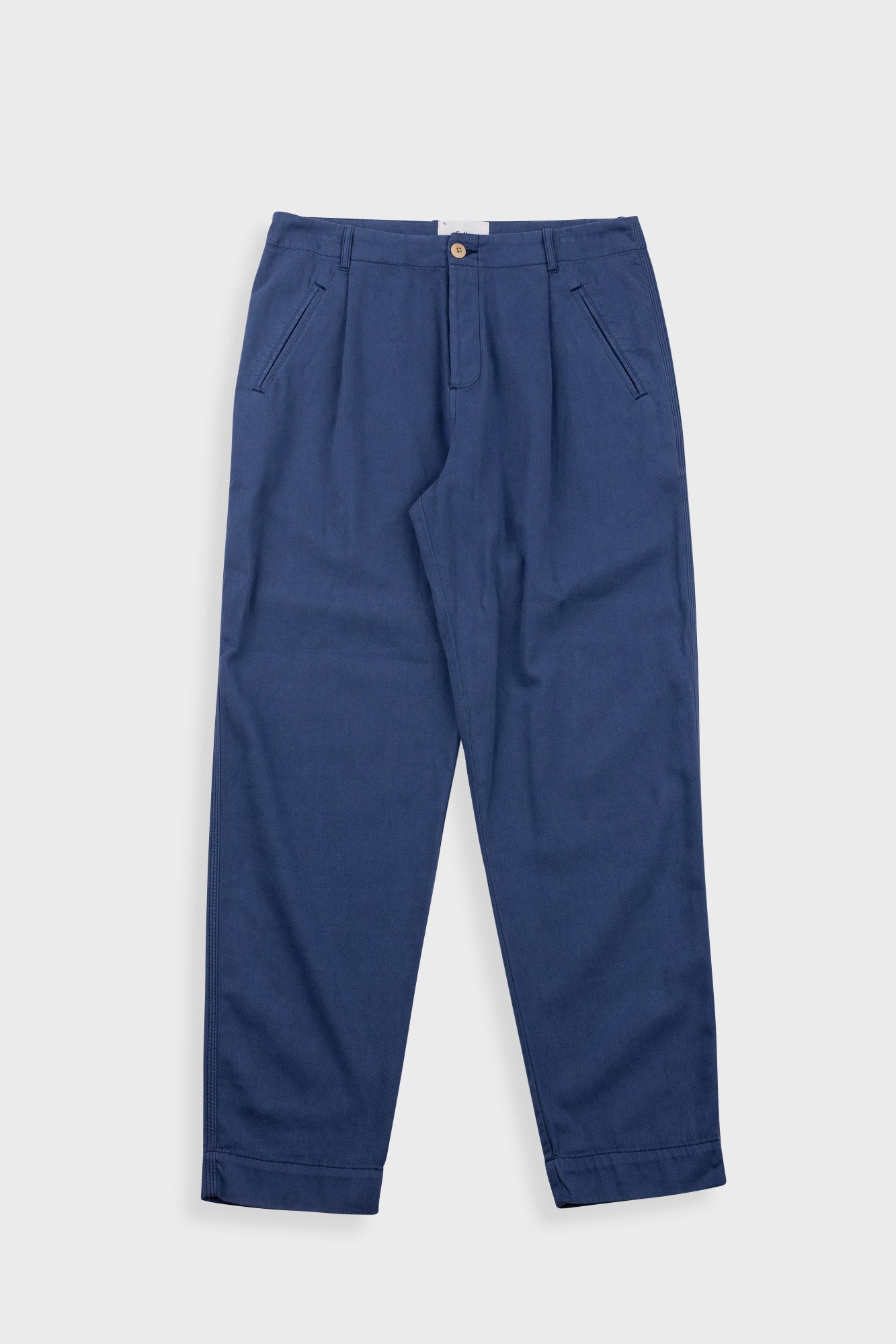 Blue pants on a light gray background