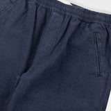 Navy blue pants with an elastic waistband on a white background