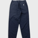 Navy blue pants on a light gray background