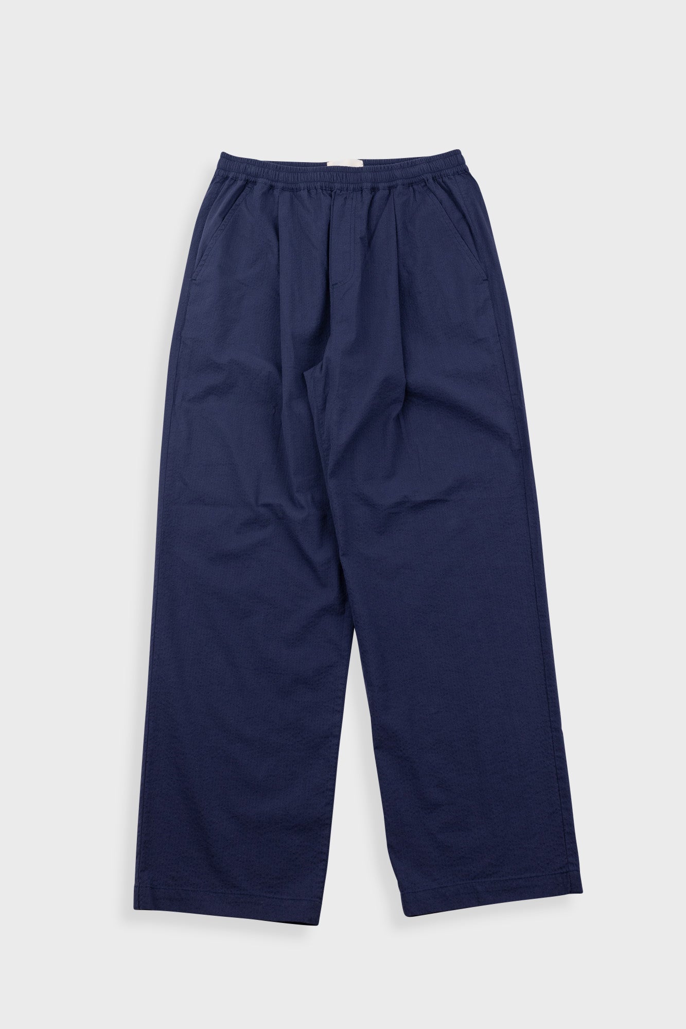 Navy blue pants on a white background