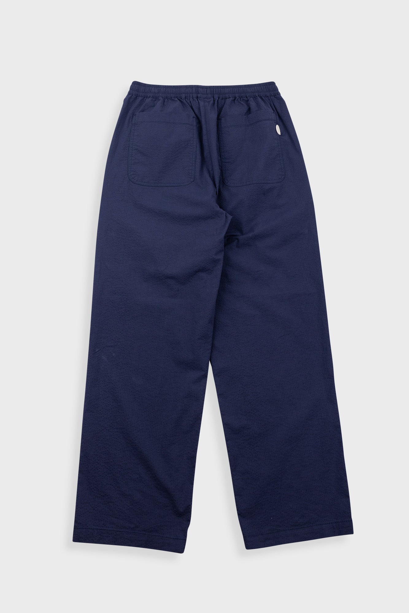 Navy blue pants on a white background