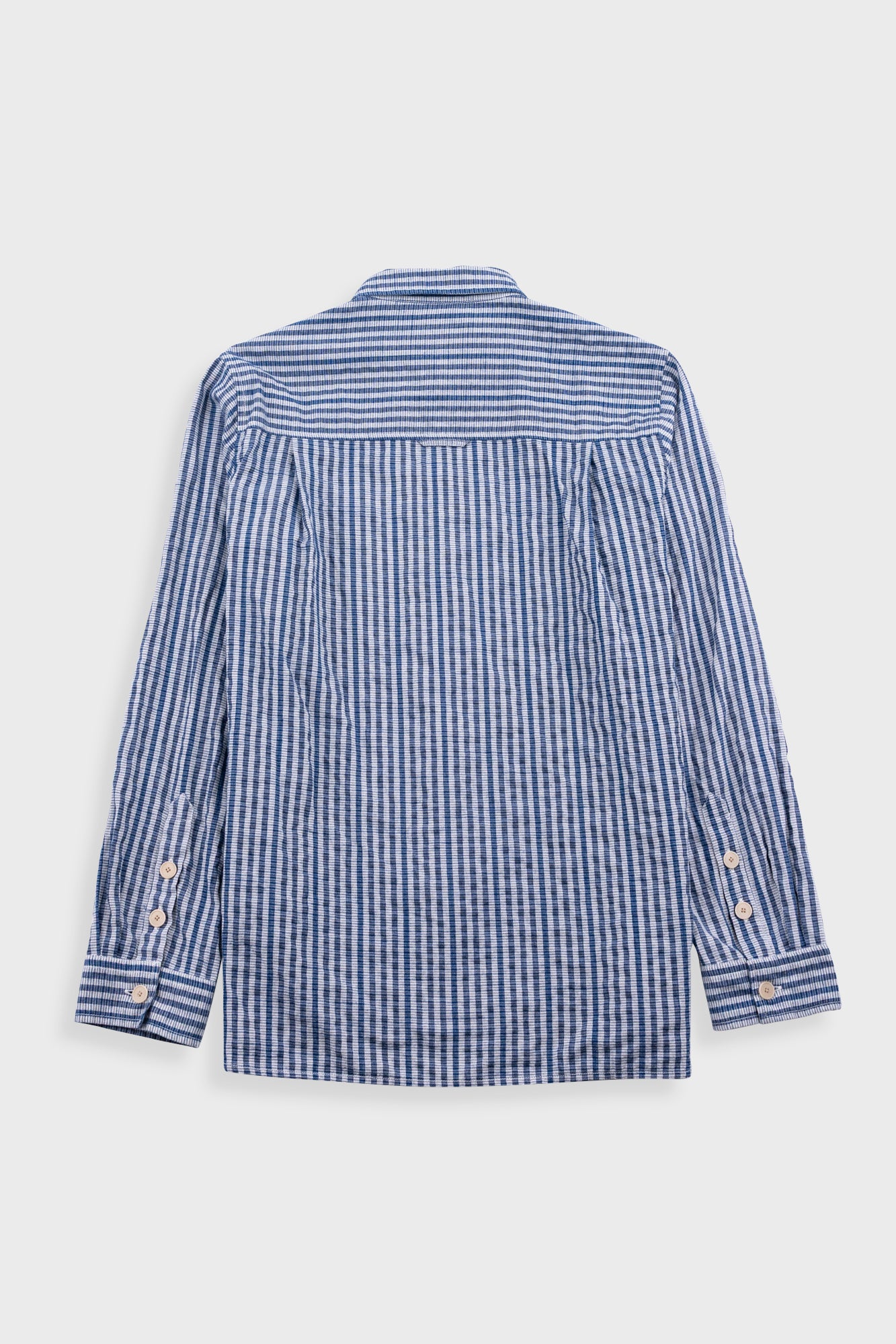 Blue striped shirt on a white background