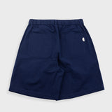 Navy blue shorts on a light gray background