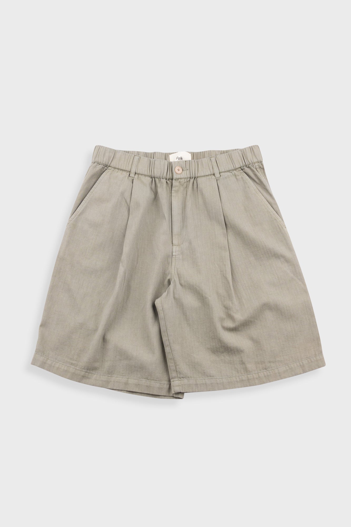 Beige shorts on a white background