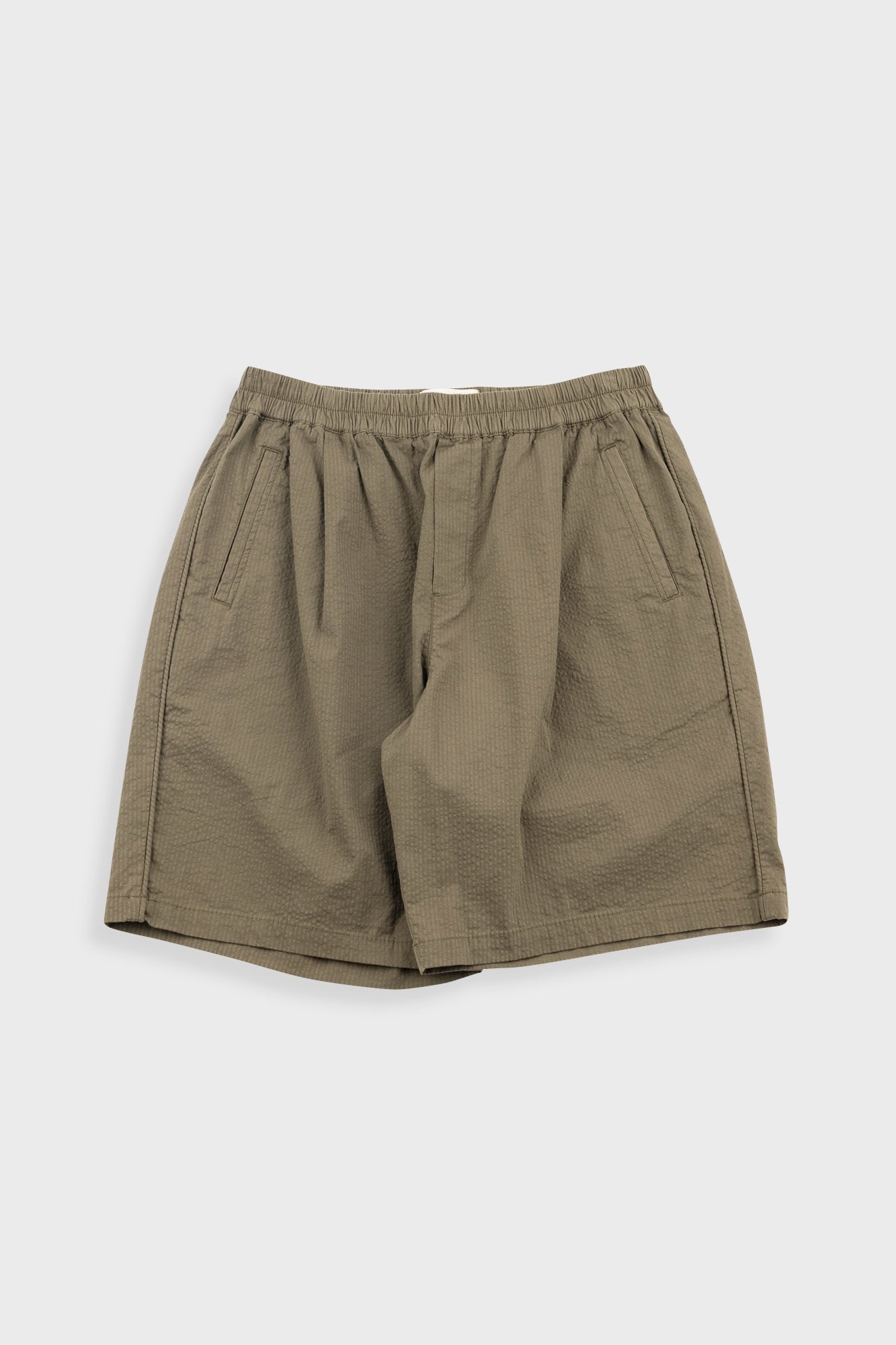 Khaki shorts on a white background