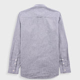 Grey striped shirt on a light gray background