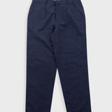 Navy blue pants on a light gray background