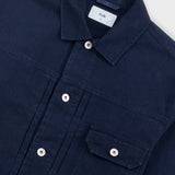 Navy blue shirt with button details on a white background