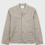 Sage blazer against a light grey background