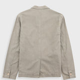 Beige jacket on a light gray background