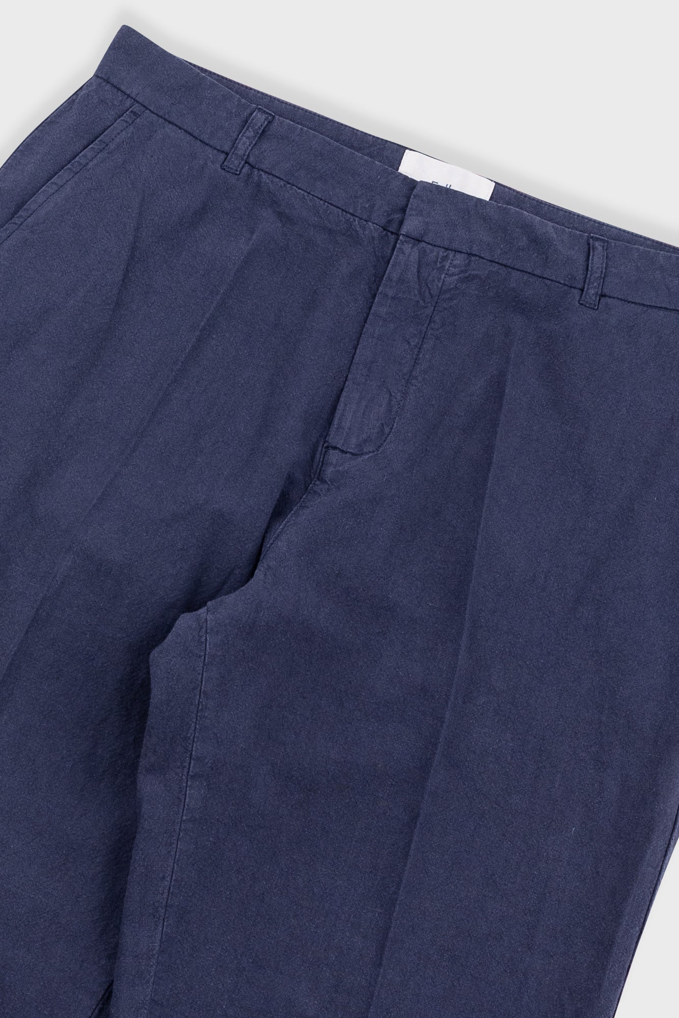 Navy blue pants on a white background