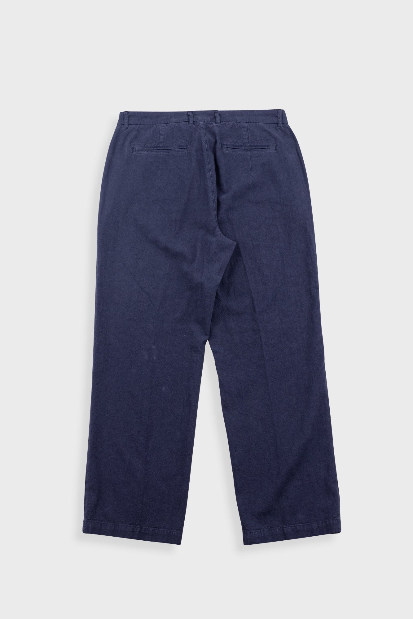 Navy blue pants on a light gray background