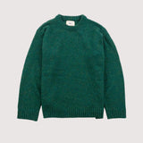 Green sweater on a light gray background