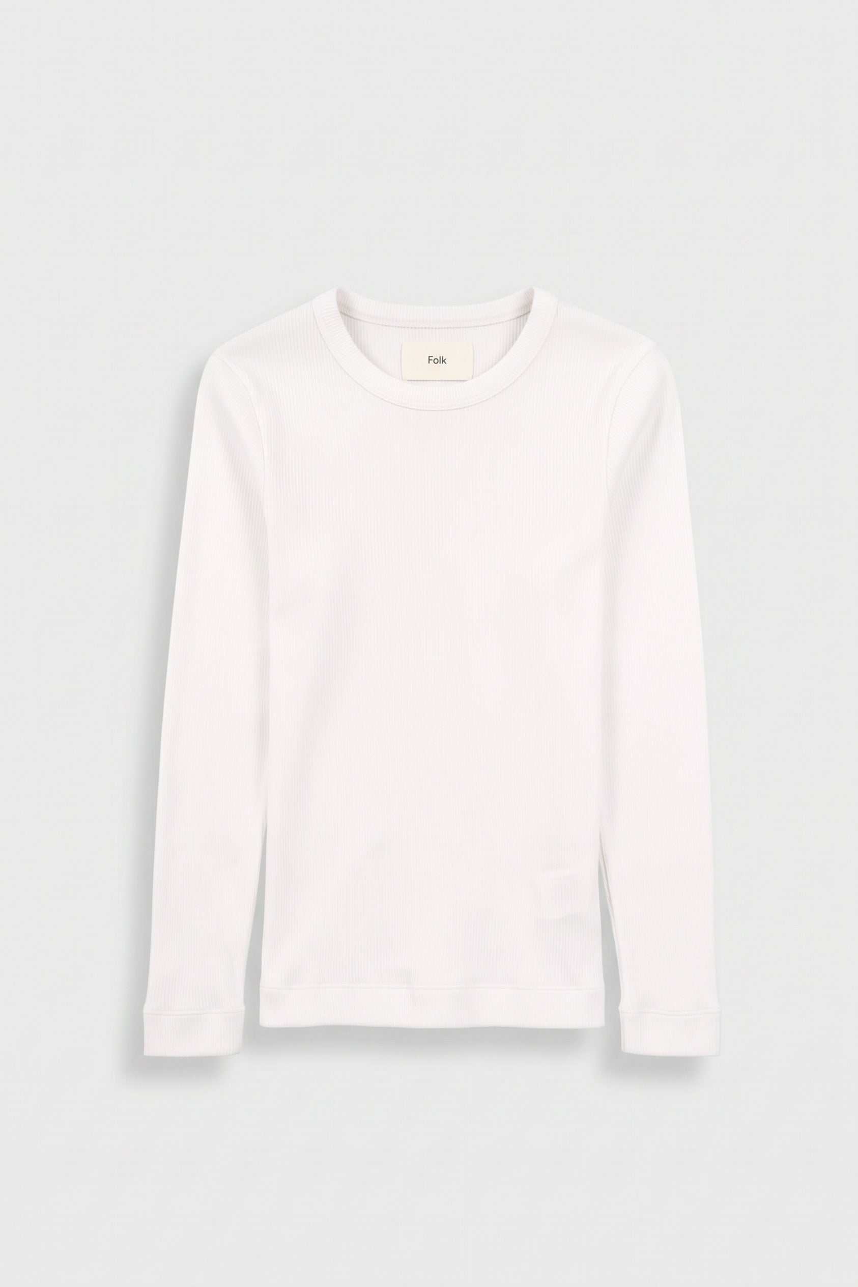 White long sleeve t-shirt against a light grey background