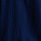 Close up of dark navy crepe fabric