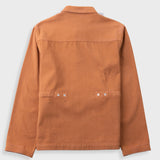 A long-sleeve utility jacket in a warm rust-orange color, shown from the back against a light gray background.