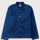 A dark blue denim work jacket with a button-up front, pointed collar, and two front patch pockets, displayed flat against a light gray background.