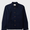 A dark navy blue corduroy utility jacket with brown buttons, a pointed collar, and a chest pocket, displayed flat against a light gray background.