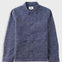 A textured blue and gray heathered wool-blend jacket with a pointed collar, brown buttons, and a chest pocket, shown flat on a light gray background.