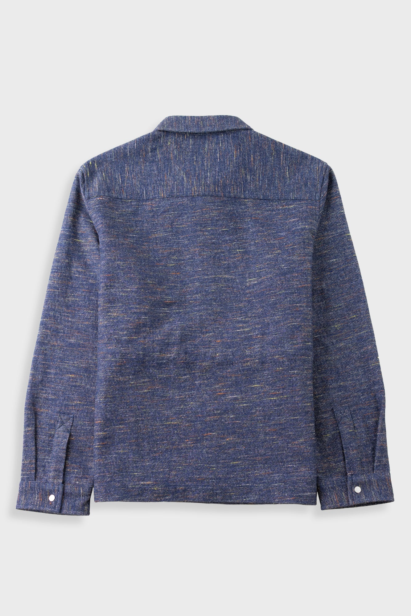 A textured blue long-sleeve shirt jacket shown from the back, featuring a subtle heathered pattern with fine orange and yellow flecks, set against a light gray background.