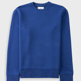 A royal blue crewneck sweatshirt with ribbed cuffs and hem, displayed flat against a light gray background.