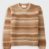 A long-sleeve crewneck knit sweater with horizontal stripes in shades of tan, brown, and cream, displayed flat against a light gray background.
