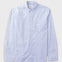 Light blue shirt laid flat against a light grey background