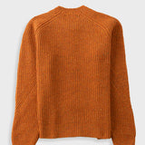 An orange ribbed knit sweater with long raglan sleeves, shown from the back against a light gray background.