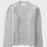 A light gray ribbed knit sweater with subtle yellow and blue flecks throughout, featuring a crew neck and raglan sleeves, shown against a light gray background.