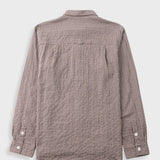 A long-sleeve button-up shirt with a brown and beige gingham check pattern, shown from the back on a light gray background.