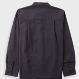 Textured brown striped shirt laid flat against a grey backdrop