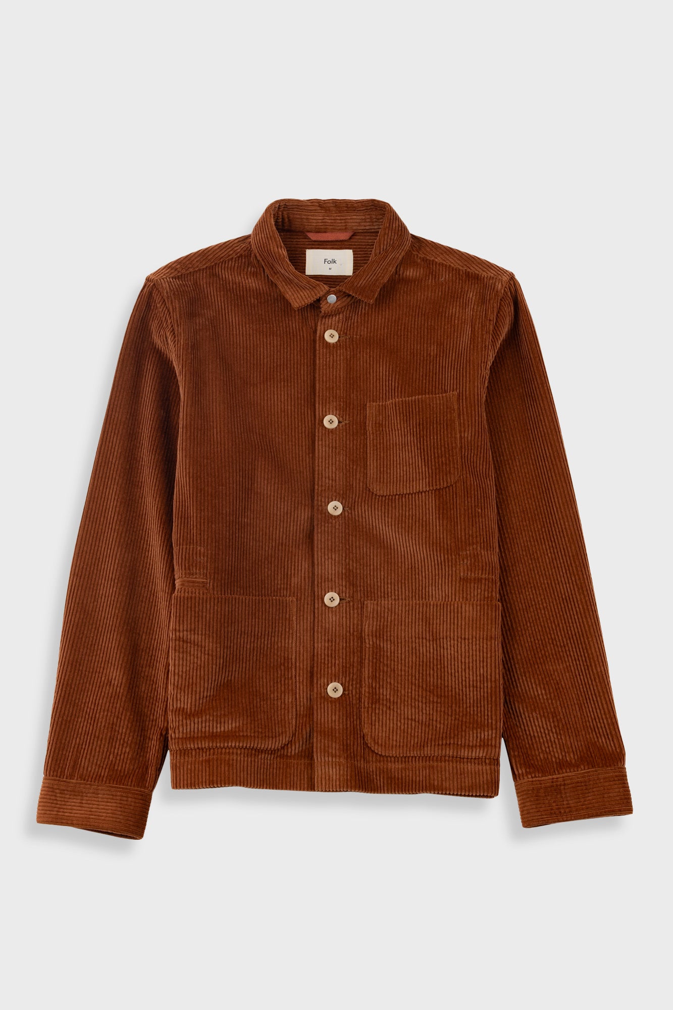 Brown corduroy shirt on a white background