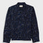 Navy patterned shirt on a light gray background
