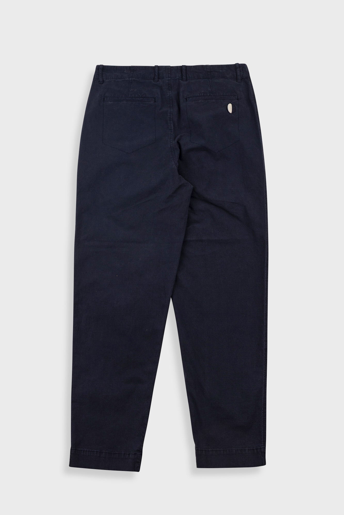Black pants on a light gray background