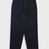 Pair of black trousers on a white background
