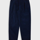 Navy blue corduroy pants on a light gray background