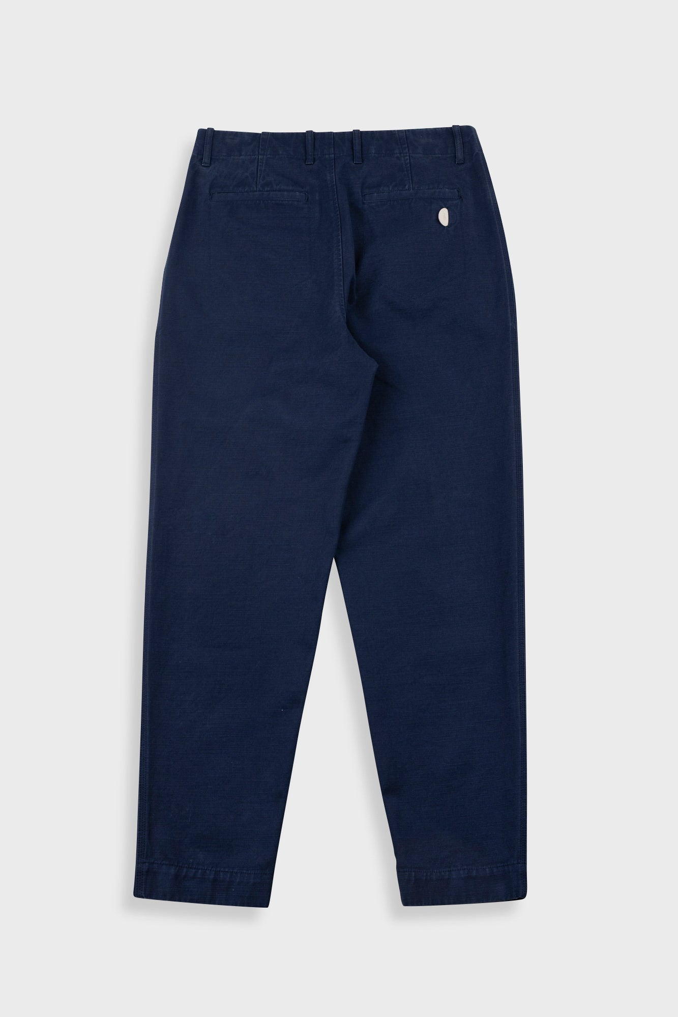 Navy blue pants on a light gray background