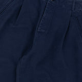 Navy blue pants with a brand label on a white background
