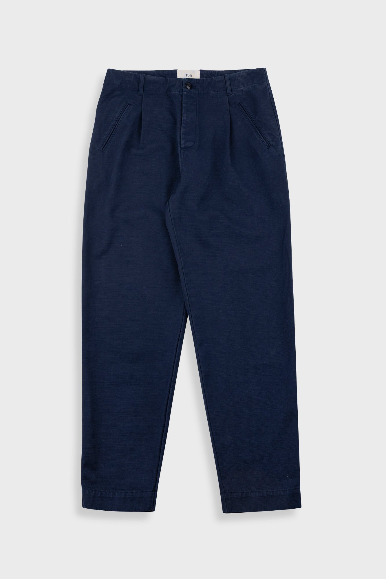 Navy blue pants on a white background