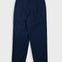 Navy blue pleated pants with a visible brand label on a white background