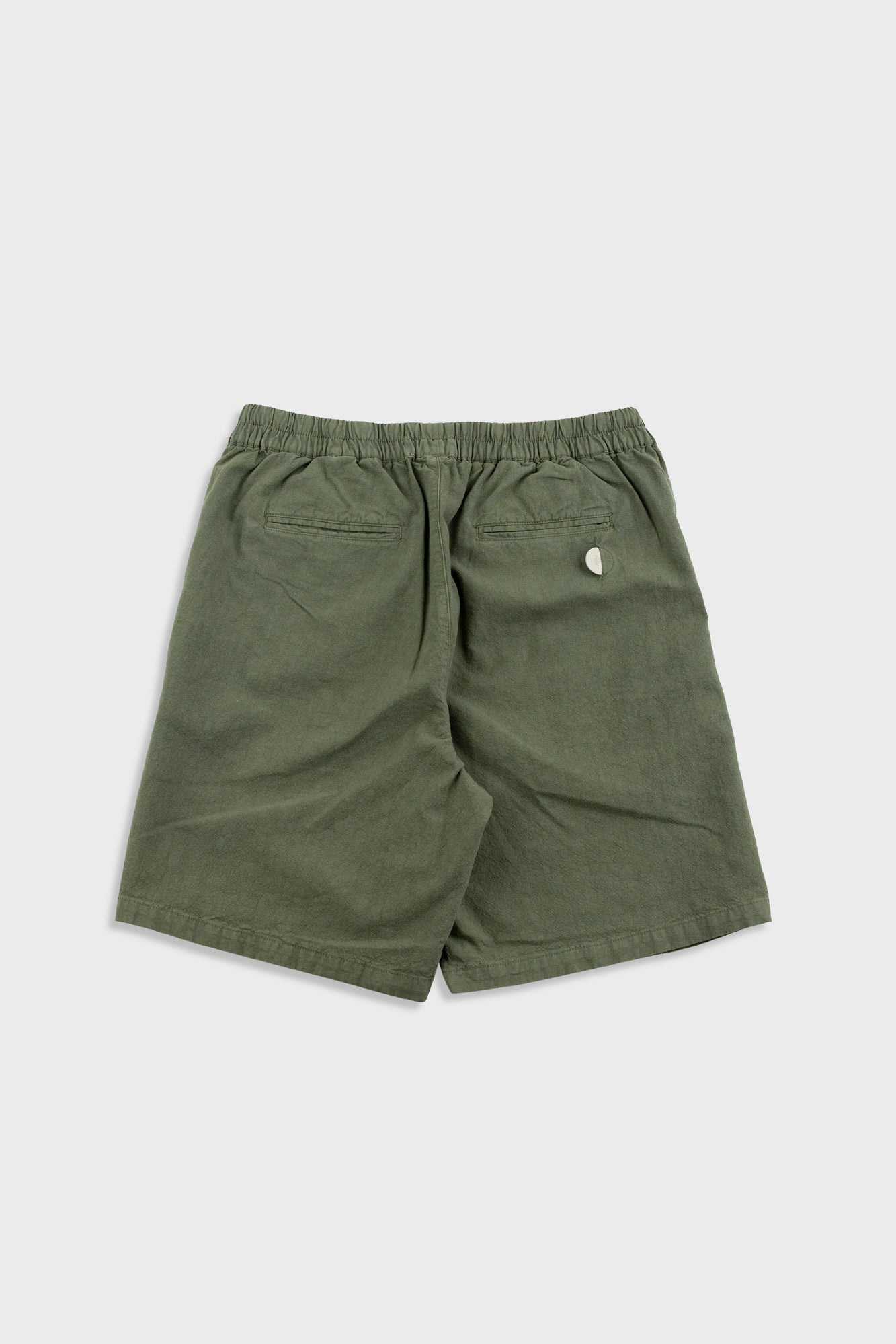 Green shorts on a white background