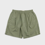 Green shorts on a white background