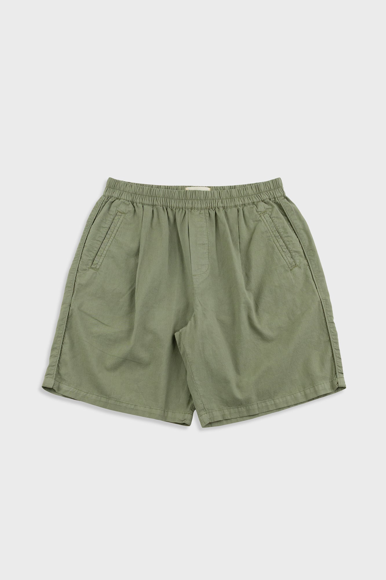 Green shorts on a white background