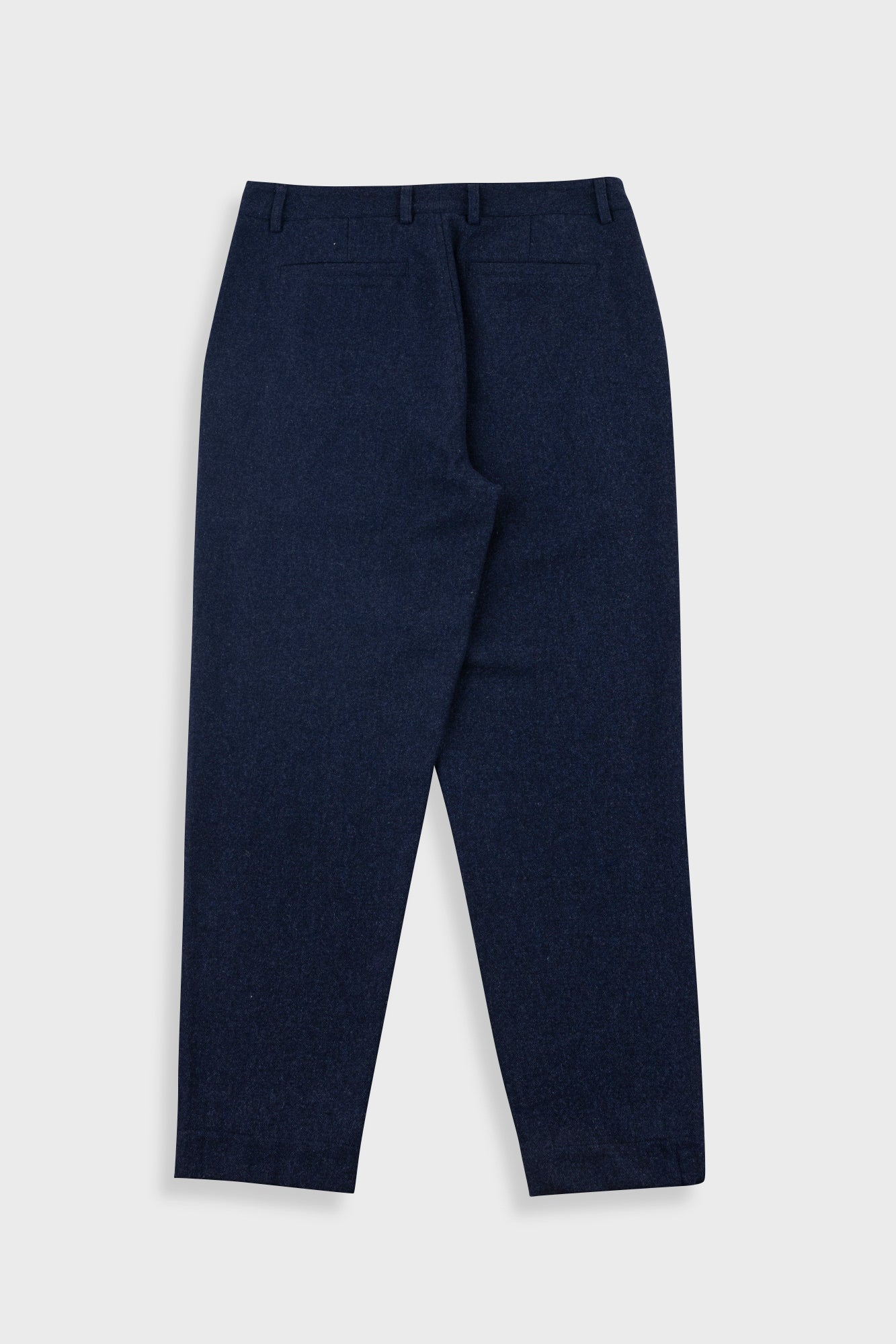 Navy blue pants on a light gray background