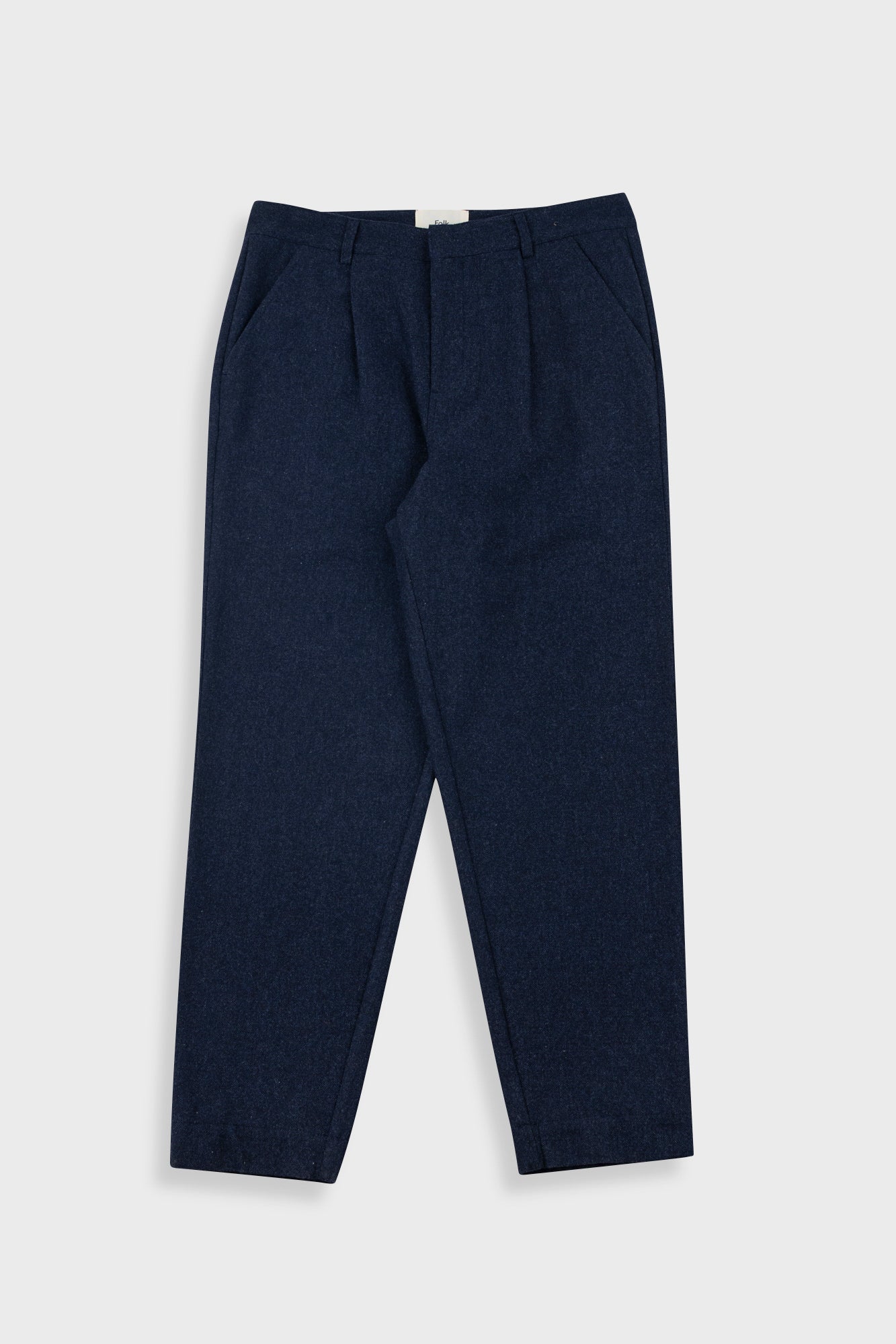 Navy blue pants on a light gray background