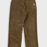 Brown corduroy pants on a white background