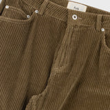 Brown corduroy pants with a visible brand label on a white background