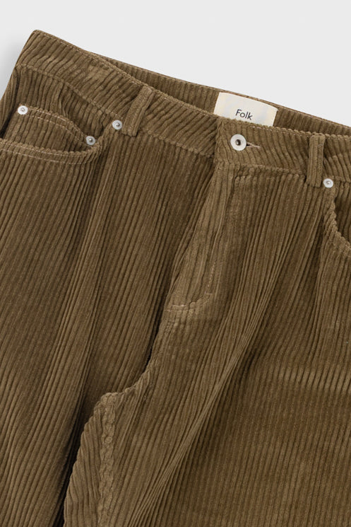 Brown corduroy pants with a visible brand label on a white background